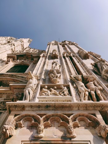 Brown Building With Statues