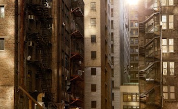 brown buildings under sunny sky
