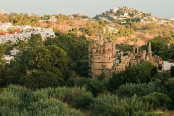 Brown Castle in Forest Under Clear Day Sky