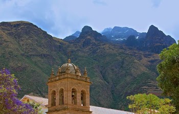 brown castle near mountain during daytime