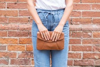 Brown Clutch Gently Held
