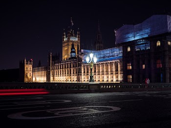 Brown Concrete Building during Nighttime