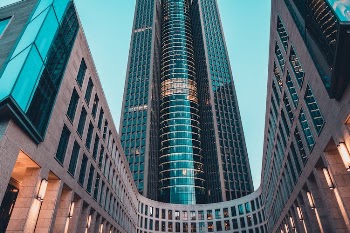 Brown Concrete Building Under Blue Sky