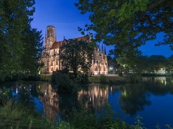 Brown Concrete Castle Near Body of Water