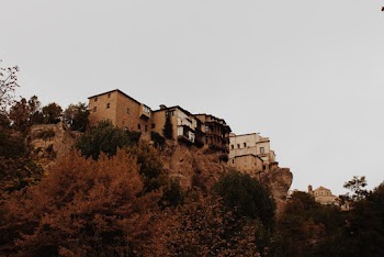 Brown Concrete House on a Hill