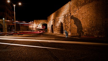 Brown Concrete Wall during Night Time Photo