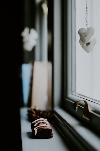 Brown Cookie on Window Surface