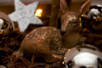 Brown Deer Figurine and White Star Decor