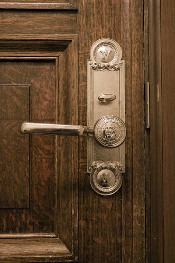 Brown Door With Silver Door Lever