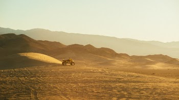 Brown Field Under White Sky