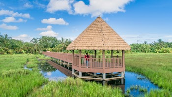 Brown Gazebo on Body of Water