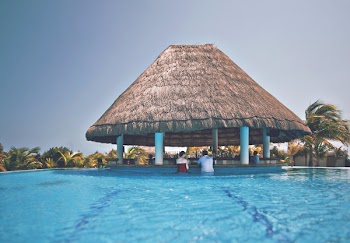 Brown Gazebo Surrounded by Pool