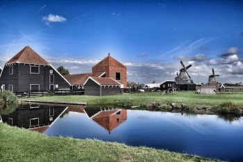 Brown Grey Barn House Near Windmill during Daytime