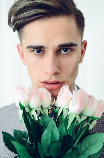 Brown Haired Man Holding White-and-pink Rose Flowers Bouquet