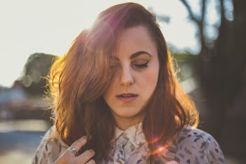Brown Haired Woman Closed Eyes