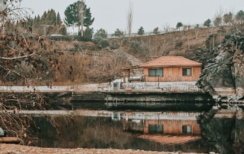 Brown House Near Body of Water