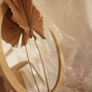 Brown Leaf on Round Brown Wooden Framed Mirror