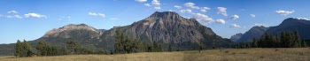 Brown Mountain Under Blue and White Sky