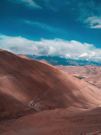 Brown Mountain Under Blue Sky