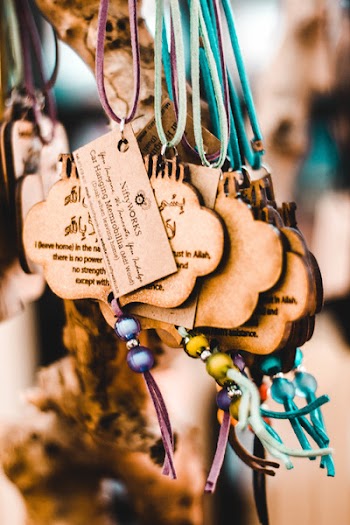 Brown Necklace Hanging on Branch