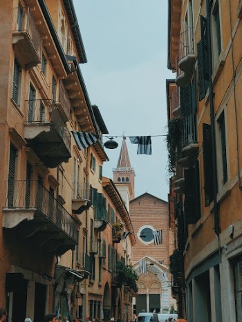 Brown Painted Buildings Under White Sky