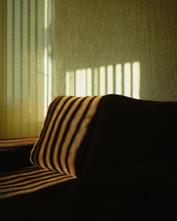 Brown Pillow Beside Wall