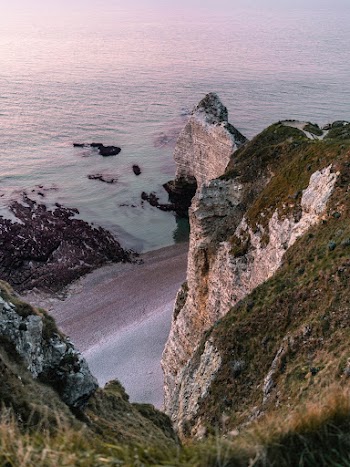 Brown Rock Formation Facing Beach