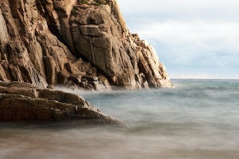 Brown Rock Formations on Sea