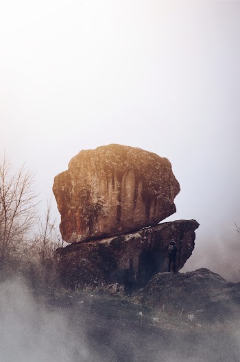 Brown Rock on Cliff
