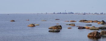 Brown Rocks on Body of Water