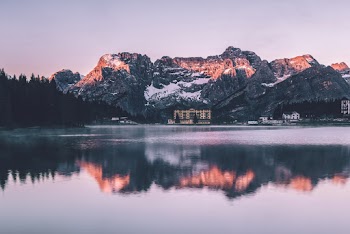 Brown Rocky Mountain Across Body of Water