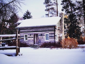 Brown Shack Covered With Snow