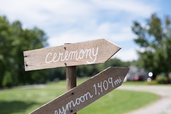 Brown Signage Showing Ceremony Text in Tilt Shift Photography