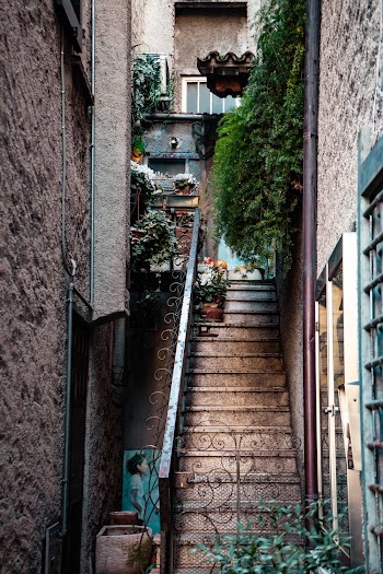 Brown Stairs With Black Metal Railings