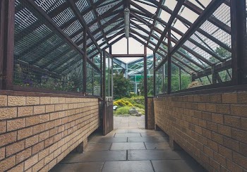 brown tiled hallway indoor photo