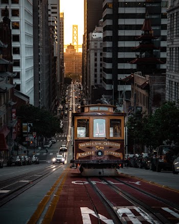 Brown Tram on Road