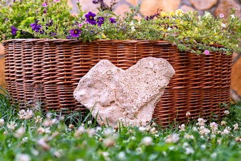 Brown Wicker Basket Beside Stone