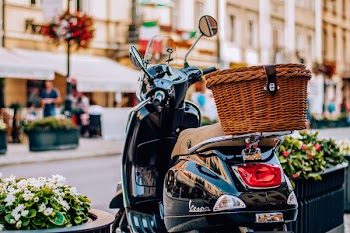 Brown Wicker Basket on Black Motor Scooter