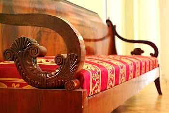 Brown Wodoen Red Cushioned Couch