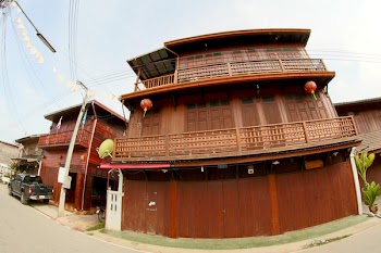 Brown Wooden 3-storey House