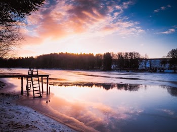 Brown Wooden A-frame Ladder Beside Water