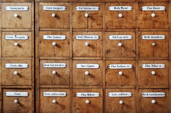 brown wooden apothecary cabinet