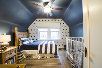 Brown Wooden Bed Frame and Blue and White Striped Bed Sheet