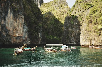 Brown Wooden Boats on River