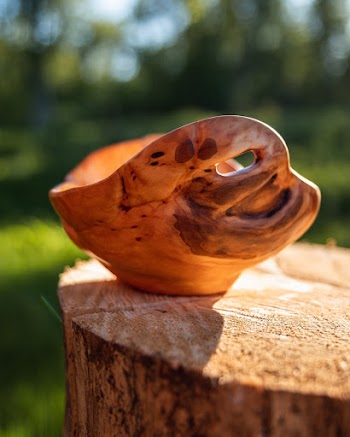 Brown Wooden Bowl on Wooden Surface