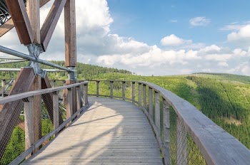 Brown Wooden Bridge Under Blue Sky