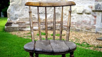 Brown Wooden Chair on Green Grass