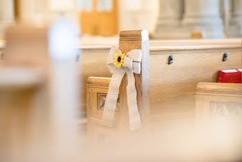 Brown Wooden Church Pew Tied With White Ribbon