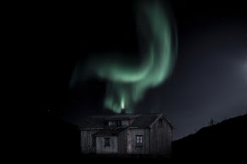 Brown Wooden House during Night Time