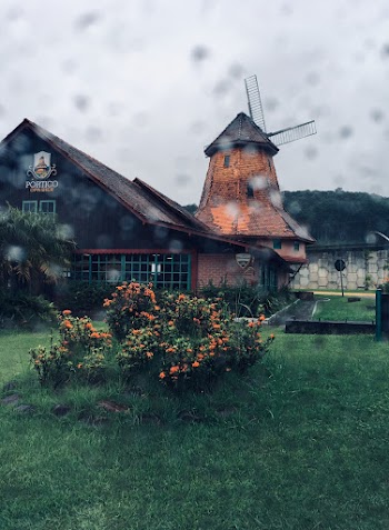 Brown Wooden House With Windmill